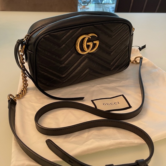 Gucci Handbags - Gucci GG Marmont matelassé bag in black, size S